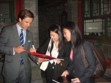 Representatives from Shambala Foundation sign the Golden Bird Foundation guest book - Inaugural Fundraising Cocktail Party – March 2008, Olivia Cox-Fill’s Beijing Hutong Home